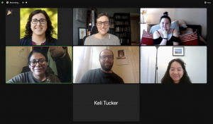 screenshot of a Zoom meeting with participants smiling