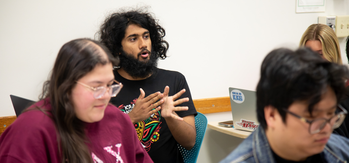 Students in “Music Video from MTV to TikTok” participating in a music fair use debate.