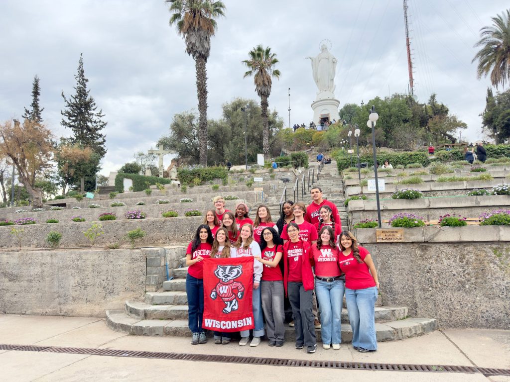 Students in Badger t-shirts outside the Sanctuary on San Cristóbal Hill.